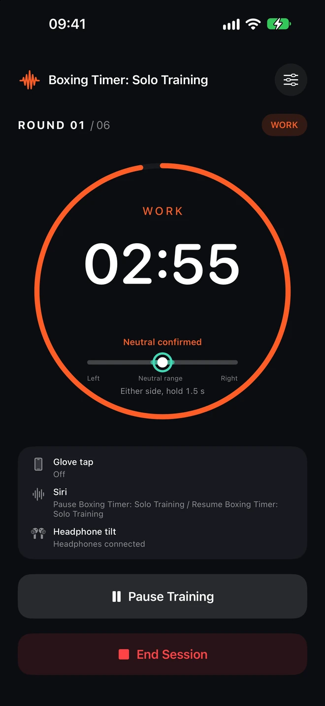 Actual Boxing Timer screen with a large round countdown and pause controls